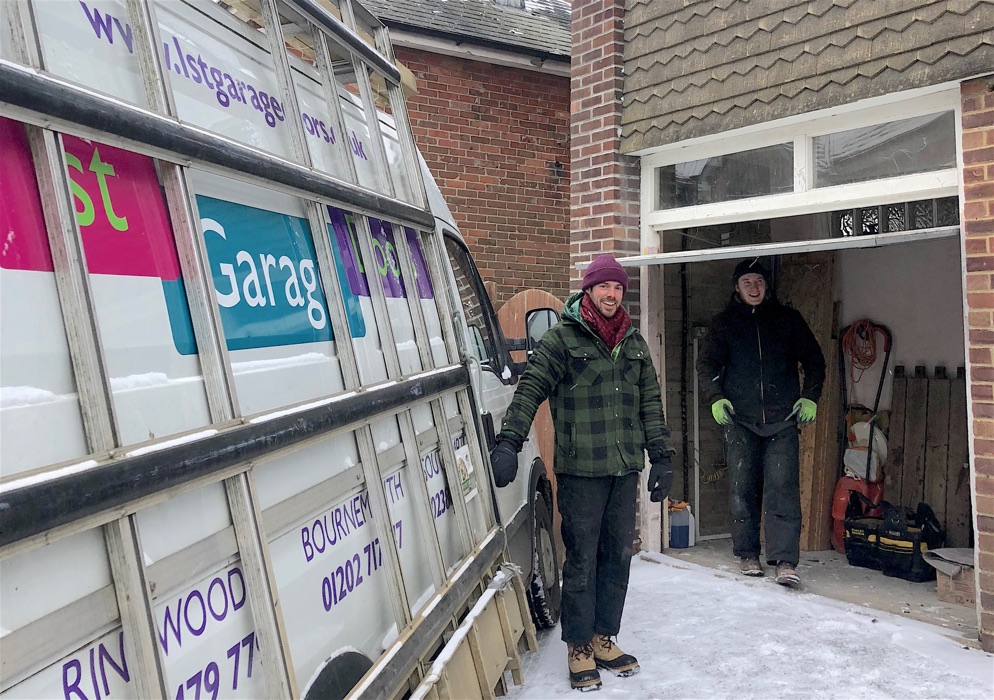 Change overhead garage door for overhead roller door - in the snow!