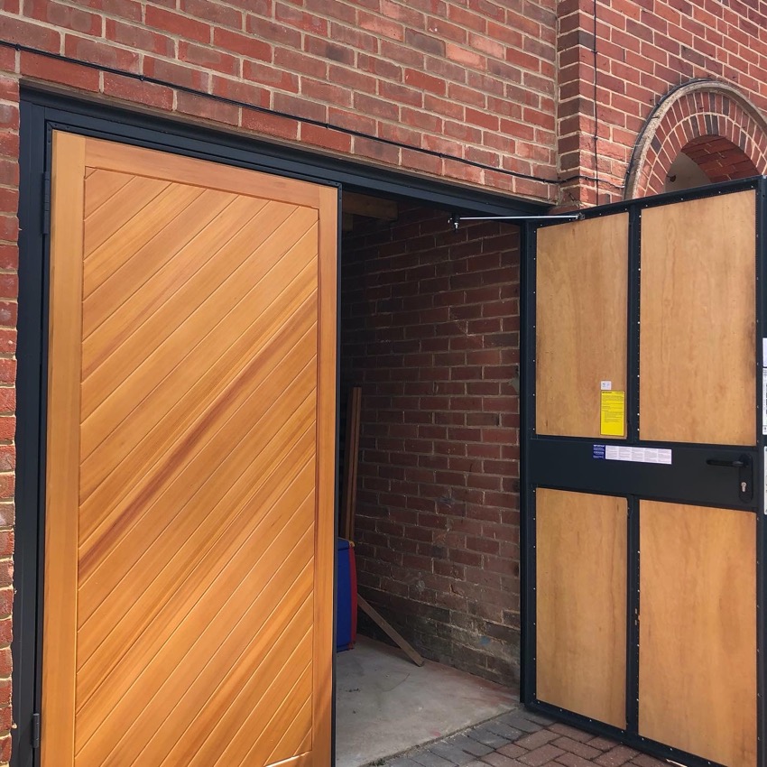 Wooden side hung garage door